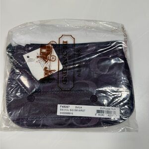 Coach Purple Signature Small Wristlet Pouch